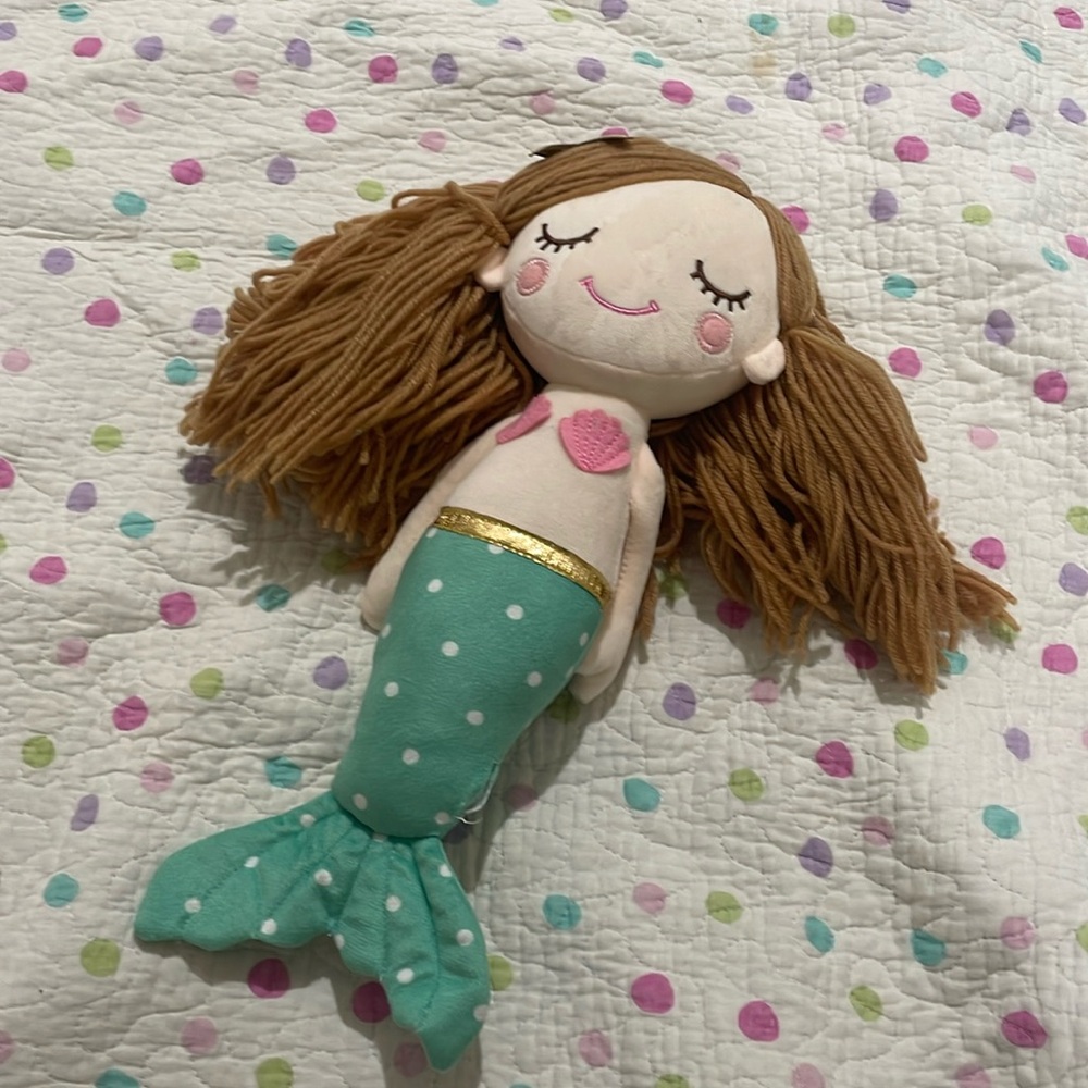 Mermaid doll, new without tags , torn